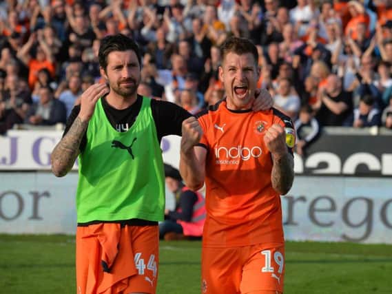 James Collins and Alan Sheehan celebrate beating Bristol Rovers