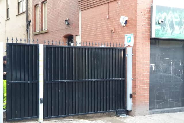 The gate has been placed at the entrance of an alleyway in Chapel Street