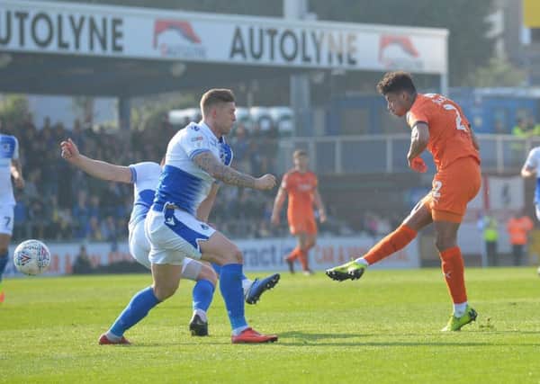 James Justin shoots for goal against Bristol Rovers
