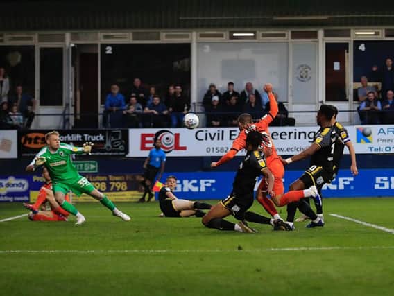 Elliot Lee scores for Luton during Tuesday night's 2-2 draw with AFC Wimbledon