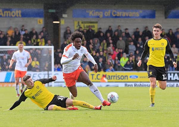 Pelly-Ruddock Mpanzu is fouled during Town's defeat at Burton on Saturday