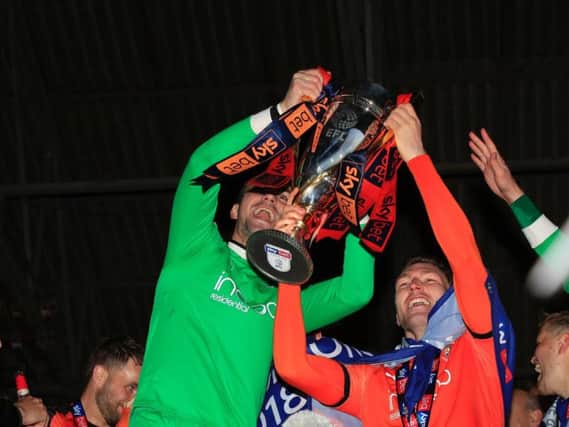 James Shea celebrates winning League One with Jack Stacey
