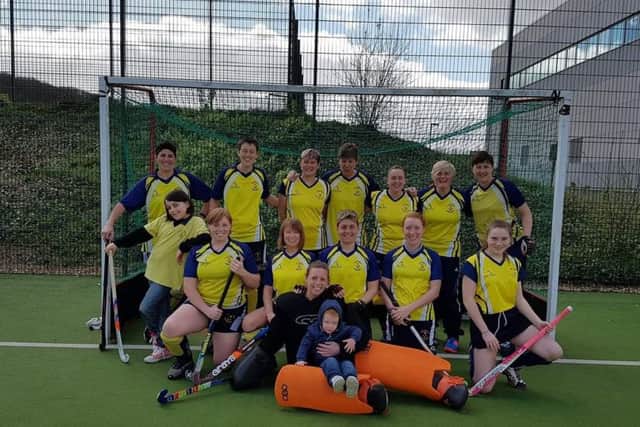 Shannon with players from The Chiltern Ladies Hockey Club.
