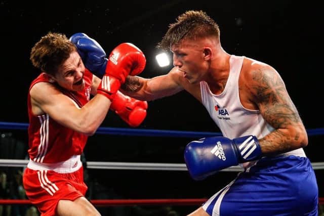 Jordan Reynolds fighting for England earlier in his career