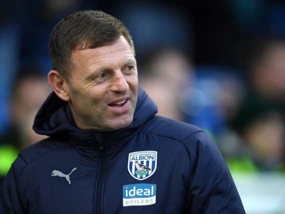 Town boss Graeme Jone during this time as West Bromwich Albion assistant
