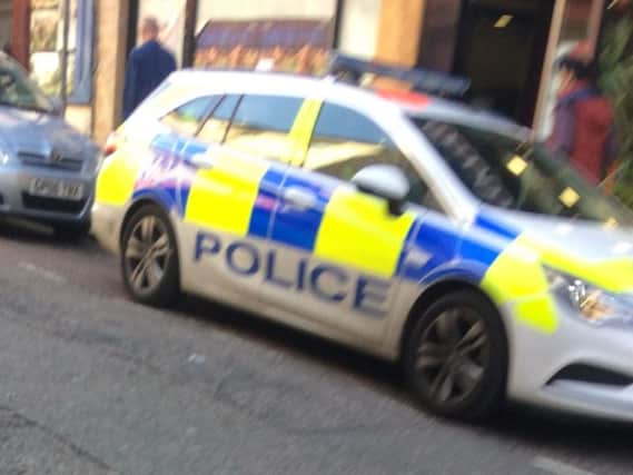 A police car at the scene in Wellington Street