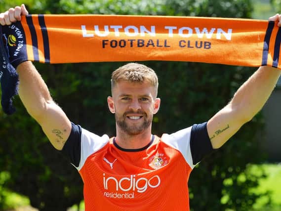 Martin Cranie has signed for Luton Town