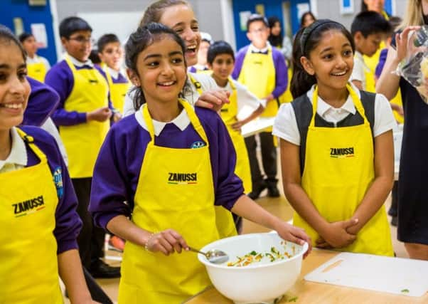 Pupils from Downside Primary School made vegetable samosas following a visit from Zanussi Cook School