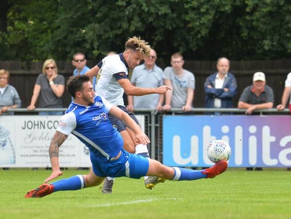 Harry Cornick lets fly against Bedford Town on Saturday