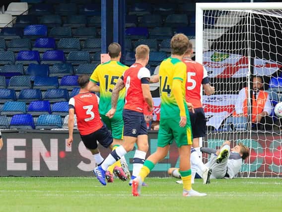 Dan Potts scores Town's only goal against Norwich
