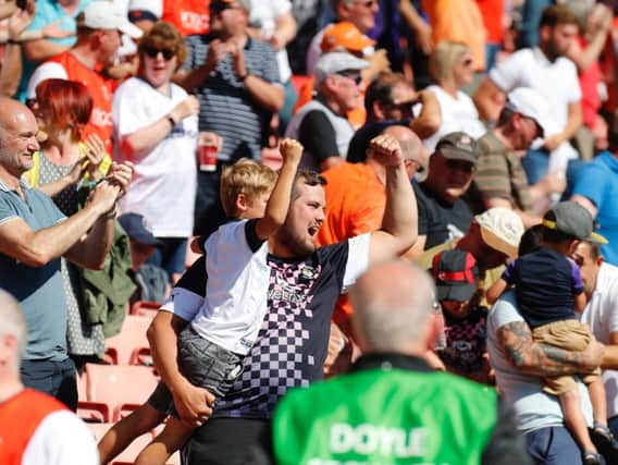Hatters fans celebrate a victory at Barnsley recently