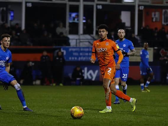 James Justin in action for the Hatters last season