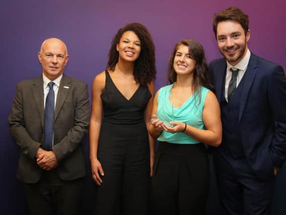 Cindy (centre left) with her award