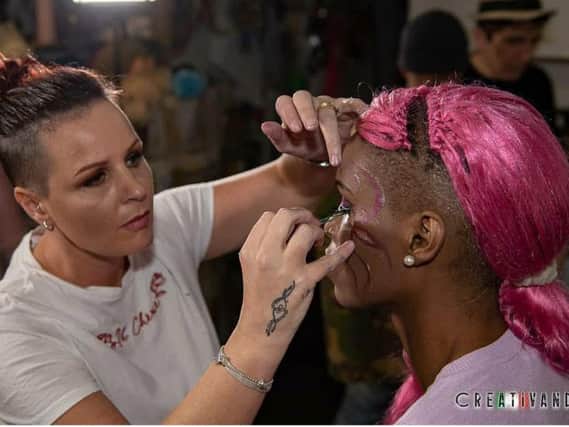 Shelley works her magic on a model at London Fashion Week