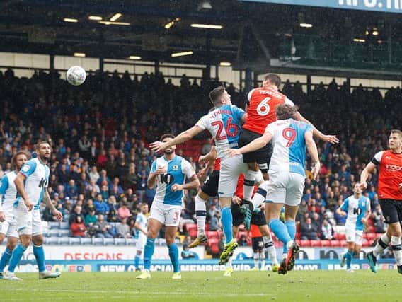 Matty Pearson heads home the winning goal at Blackburn Rovers this afternoon