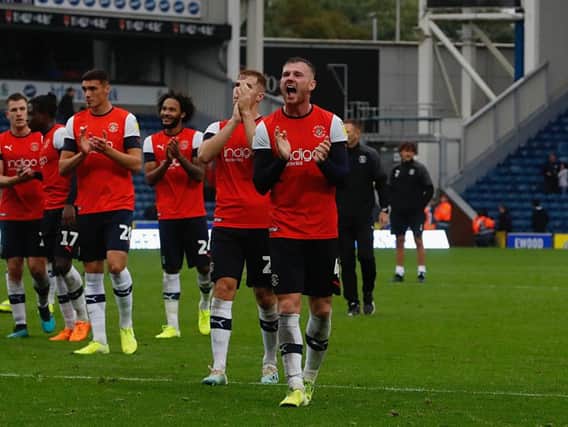 Ryan Tunnicliffe celebrates Town's win at Blackburn on Saturday