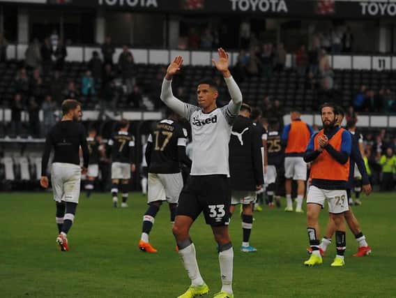 Curtis Davies applauds the Hatters fans on Saturday