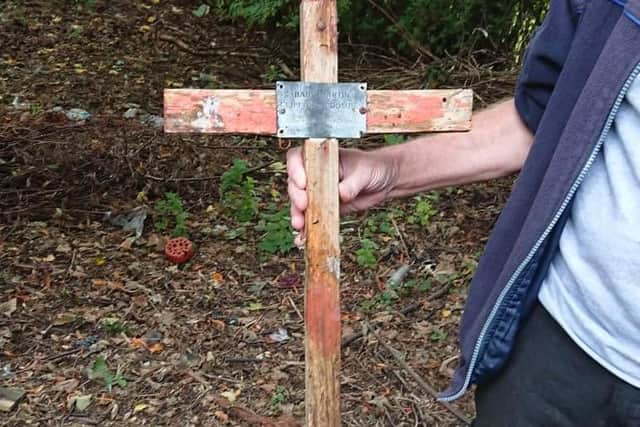The cross that was moved from Martin's son's grave