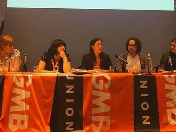 Sarah Owen (centre) at a GMB conference