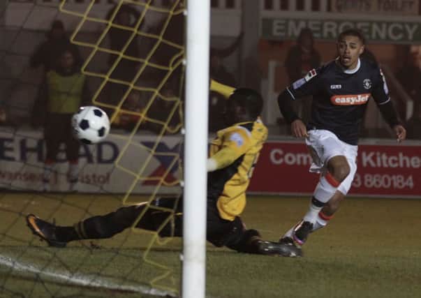 Andre Gray scores against Newport earlier in the season