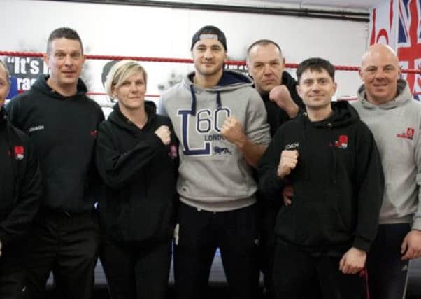 Nathan Cleverly with members of Luton Academy ABC. Photo by photographybyus.co.uk.