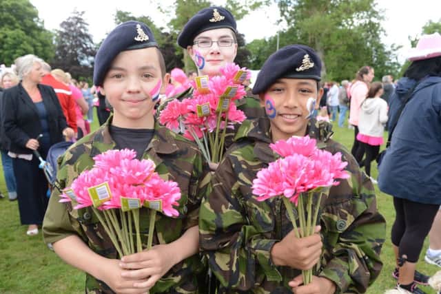 Proud cadets selling flowers at Race for Life in Luton