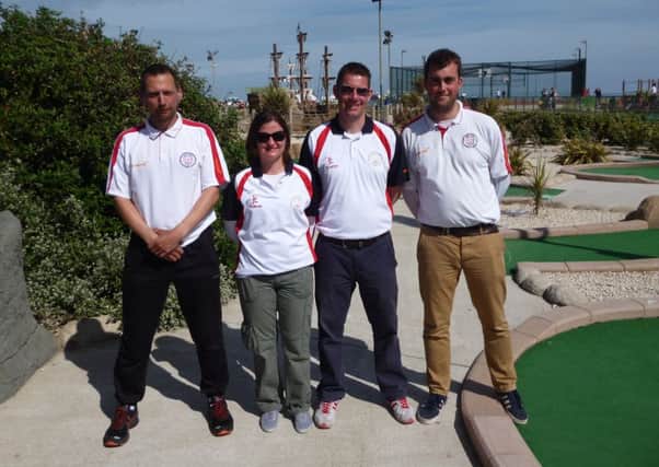 Richard and Emily Gottfried pose with their Great Britain IIIs team-mates John Moore and Craig Patterson