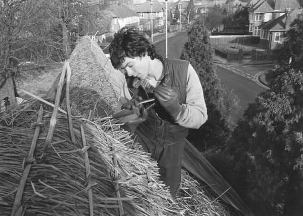 Norman King being thatched in 1980