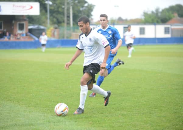Jerome Jibodu in action for Boreham Wood on Saturday