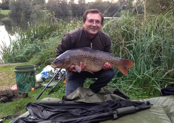 Peter Singlehurst with his 21lb common from North House Lake