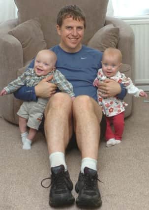 Proud dad Thom Darby with twins Caitlin and Daniel