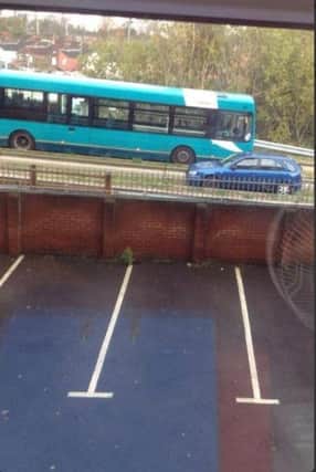 Car driving on the busway