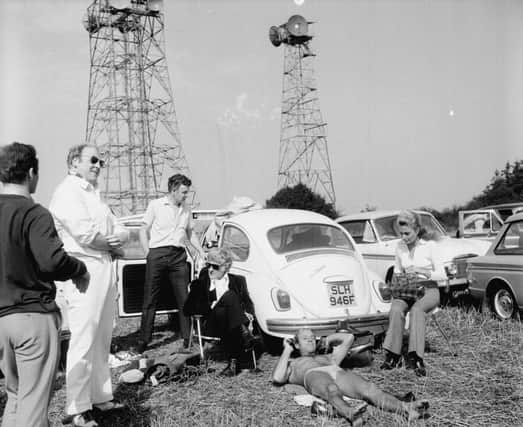 Jon Pertwee and crew during a break in filming