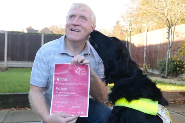 Family Hero Phil Rutter and guide dog Marcus