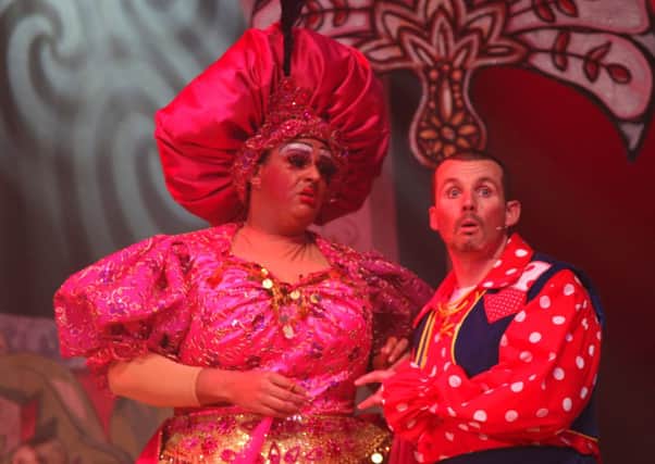 Sarah the Cook (Leon Craig) and Idle Jack (Ryan Moloney) in a hilarious scene from Dick Whittington at Dunstable's Grove Theatre
