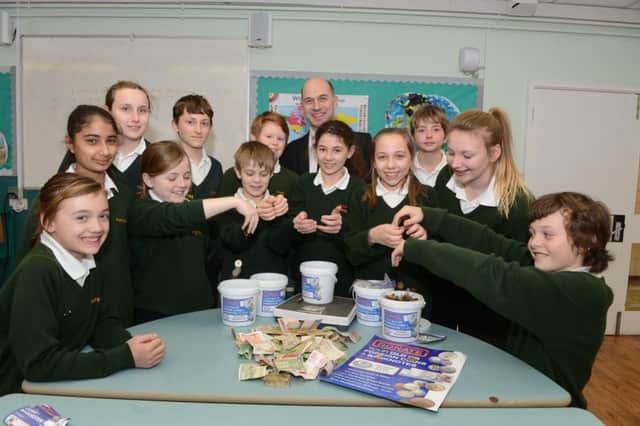 Parkfields middle school, Park road, Toddington collecting foreign coins.