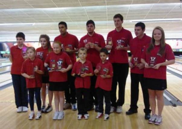 Ten-pin winners: Back row, left to right, Austin Taylor, Lorna Scott, Ki Leighfield, Remy Bader, Jonathan Bentley, Kyle Chapman and Megan Carden, and front row left to right, Ria Hunter, Toni Melton, Lewis Carden and Oliver Elliot