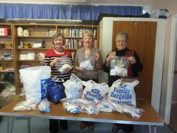 Warden Hill ladies with toilet bags