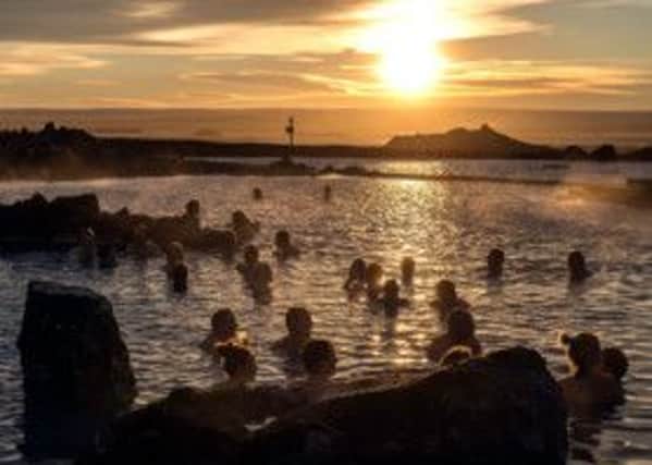 Locals enjoying the Myvatn Nature Baths in Northern Iceland. Picture: PA Photo/Renato Granieri.