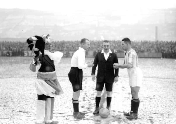 Hatters and Halifax at the coin toss ahead of their FA Cup match at the Shay in 1933
