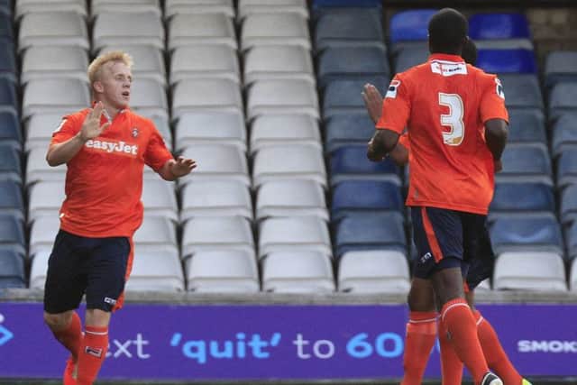 Cullen celebrates Luton's opening goal against Colchester. Liam Smith. PNL-140730-085734002