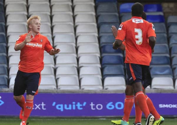 Cullen celebrates Luton's opening goal against Colchester. Liam Smith. PNL-140730-085734002