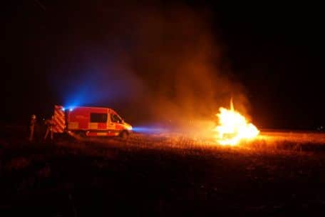 Fire fighters putting out the fire in the corn field. Photo by BFRS