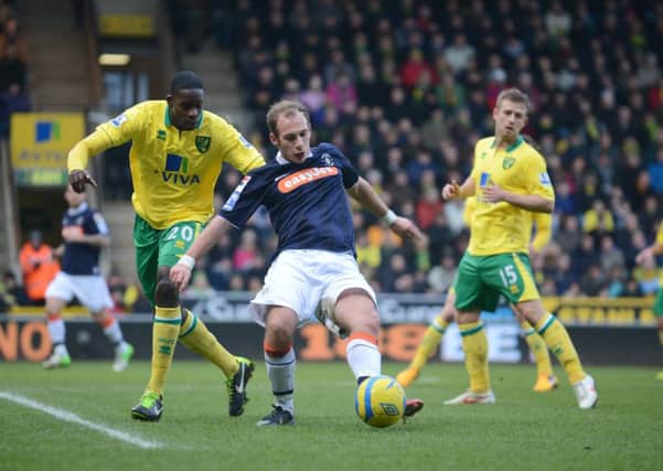 Jake Howells in action against Norwich City