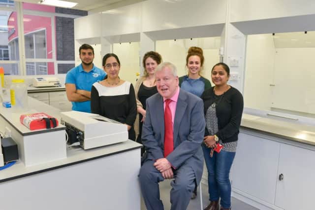 Lawrence McGinty with postgraduate students in the new lab