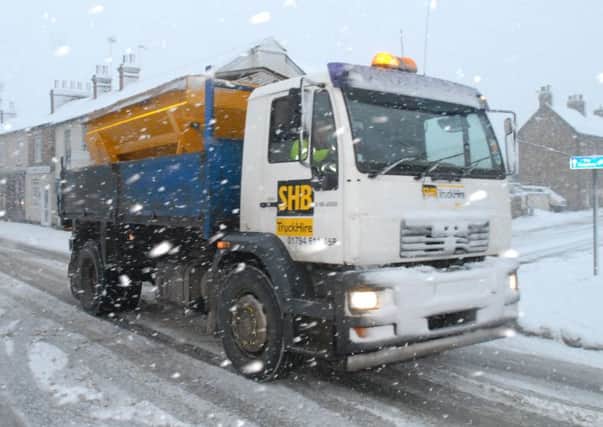 Gritter lorries keep the roads from freezing