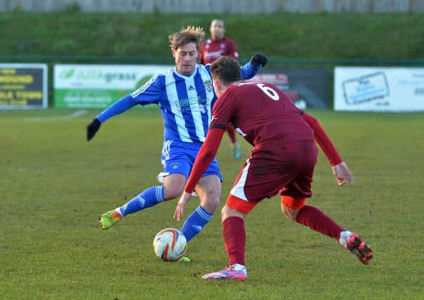 Charlie Henry in action for Dunstable against Paulton