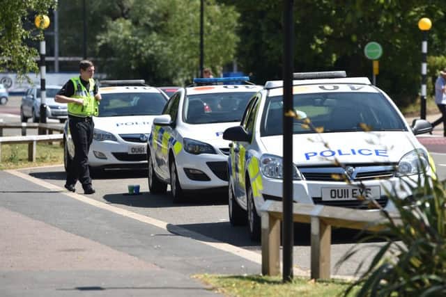 A strong police presence remained outside Grove Park on Friday