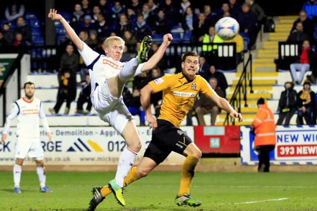 Mark Cullen scores against Cambridge
