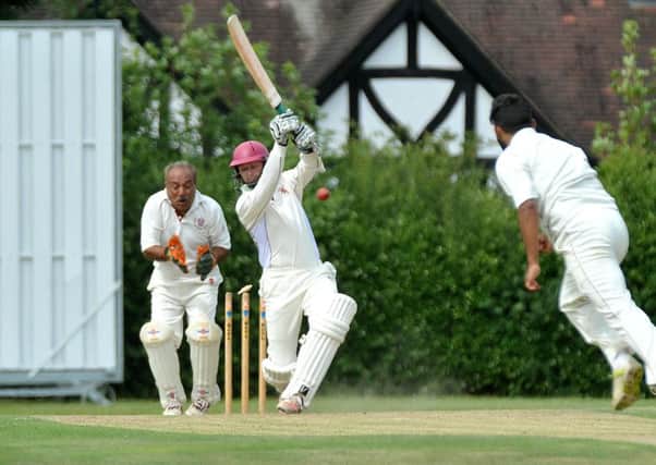 Luton Town & Indians celebrate the wicket of Ampthill batsman Callum Riches on Sunday as he is bowled by Sachin Wagh